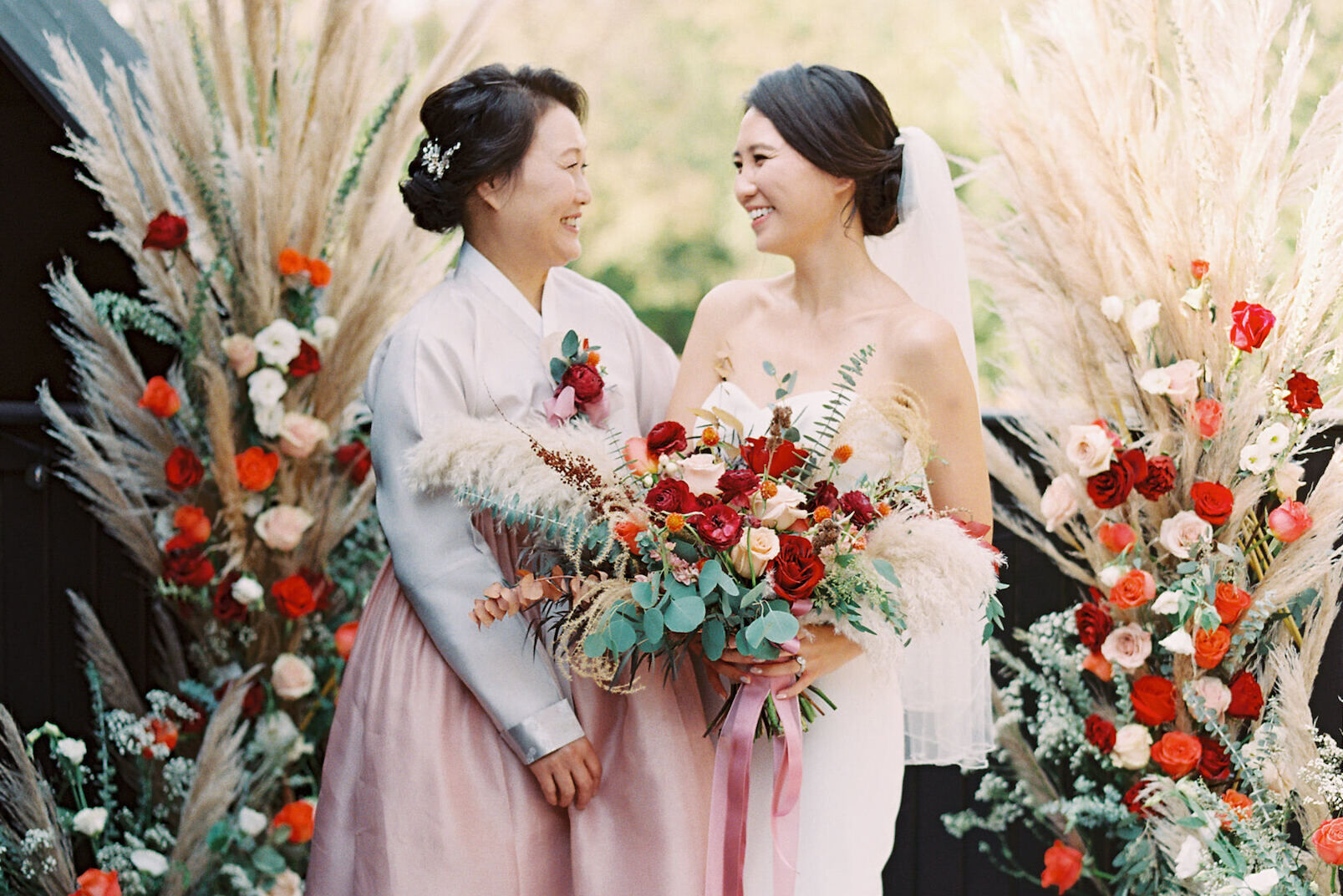 Wedding Traditions: A mother-of-the-bride wearing a traditional Korean hanbok.