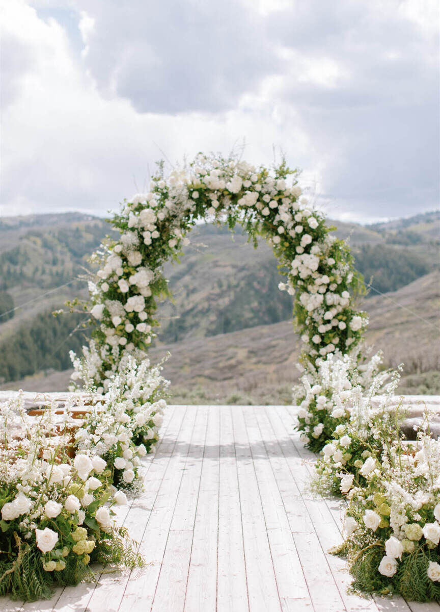 Adventurous Wedding Venues: A floral ceremony arch setup at The Lodge at Blue Sky.