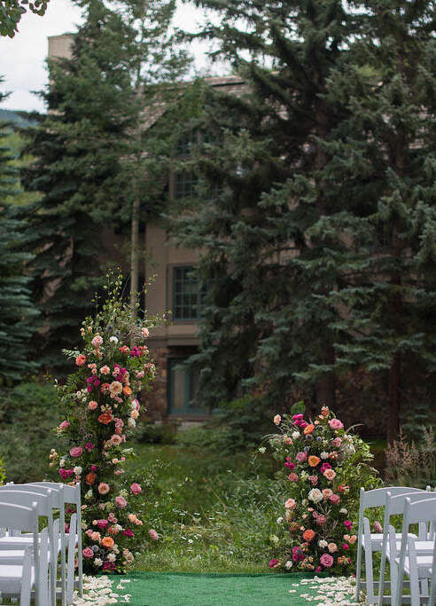 Adventurous Wedding Venues: An outdoor wedding ceremony setup at the Sonnenalp Hotel.
