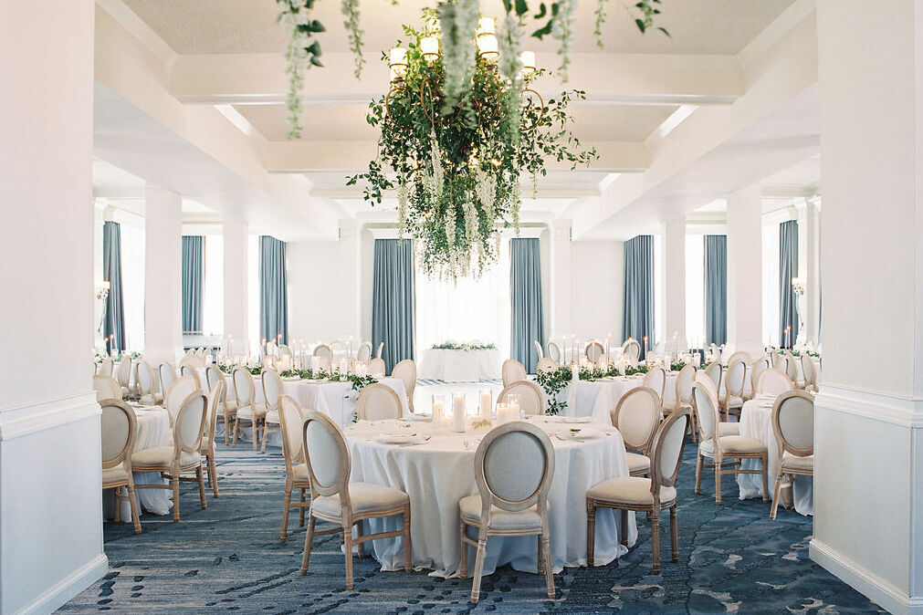 White and blue classic ballroom indoor wedding reception setup