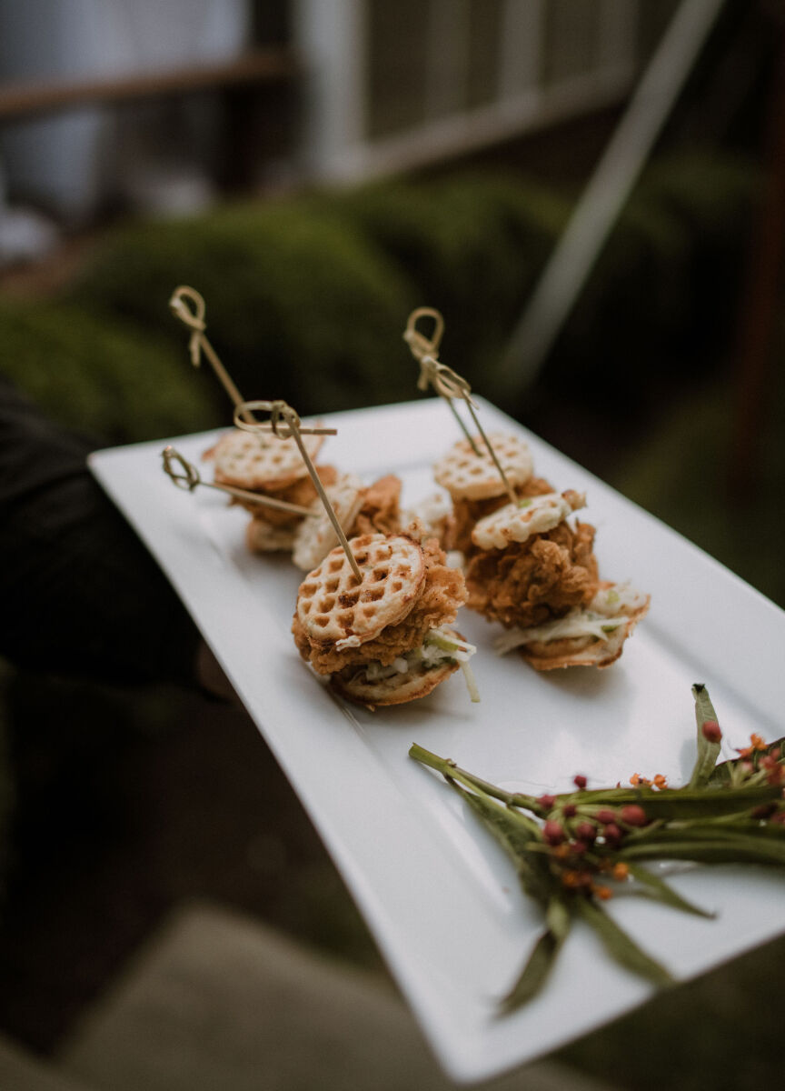 Plated wedding hors d'oeuvre, mini chiche and waffle sandwiches