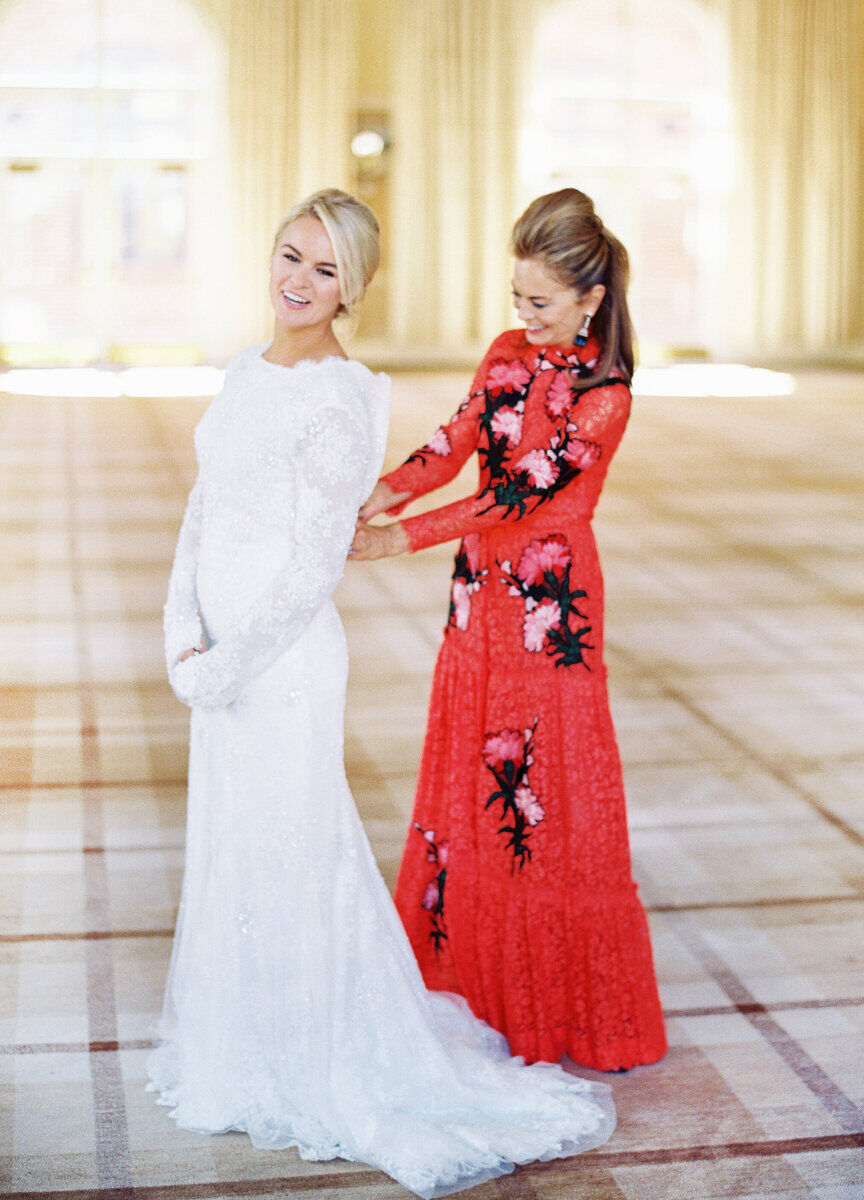 Best Mother of the Bride Dresses: A bright red gown with floral details is feminine-yet-dramatic.