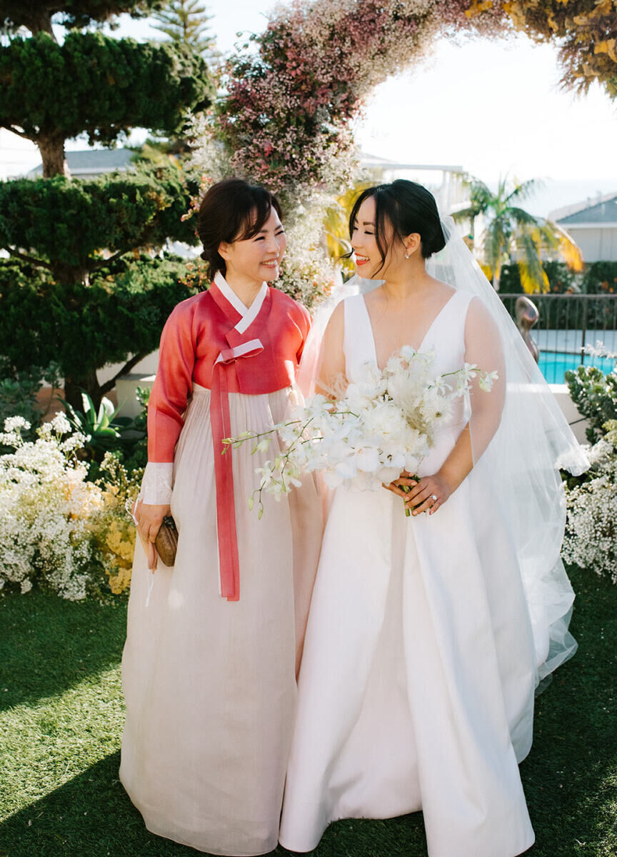 Best Mother of the Bride Dresses: A traditional Korean hanbok in a stunning blush pink palette.