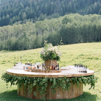 Wood bar in the forest accented with greenery