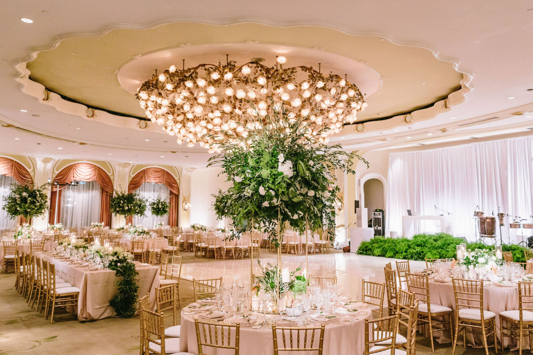Celebrity Wedding Venue: An indoor reception setup in the ballroom of the Beverly Hills Hotel.