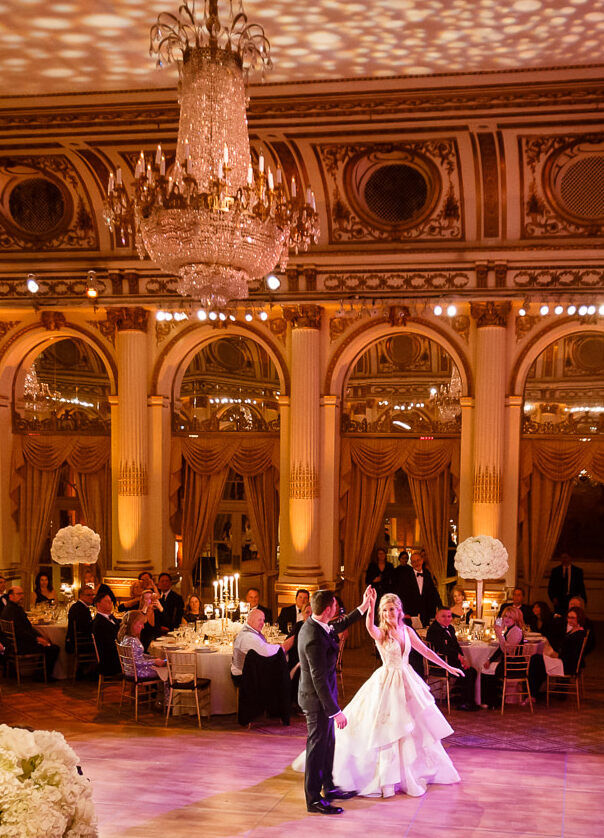 City Weddings: A wedding couple dancing on the dance floor at an indoor ballroom at The Plaza Hotel.