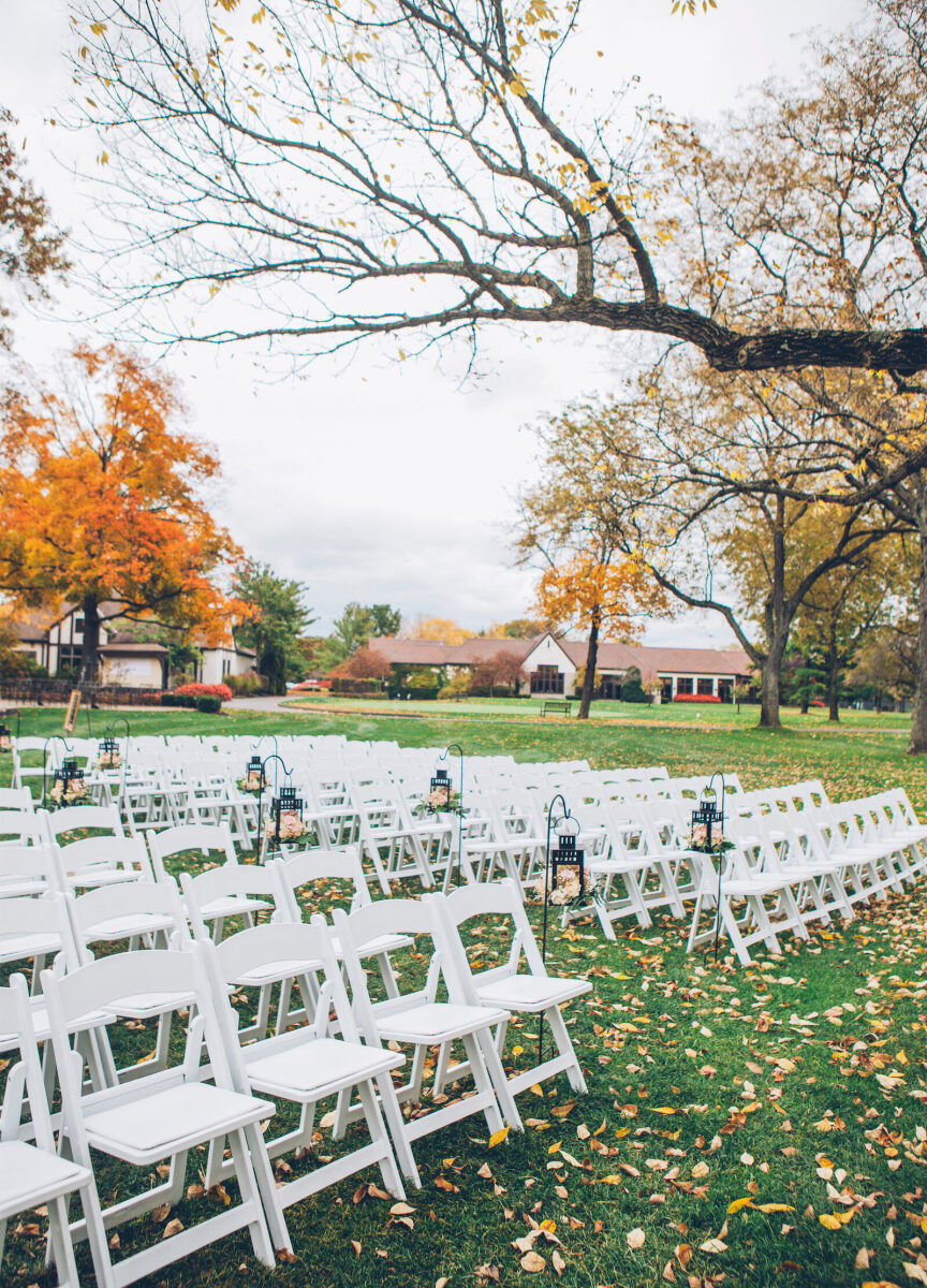 City Weddings: An outdoor fall wedding ceremony on a lawn with white chairs in Columbus, Ohio.