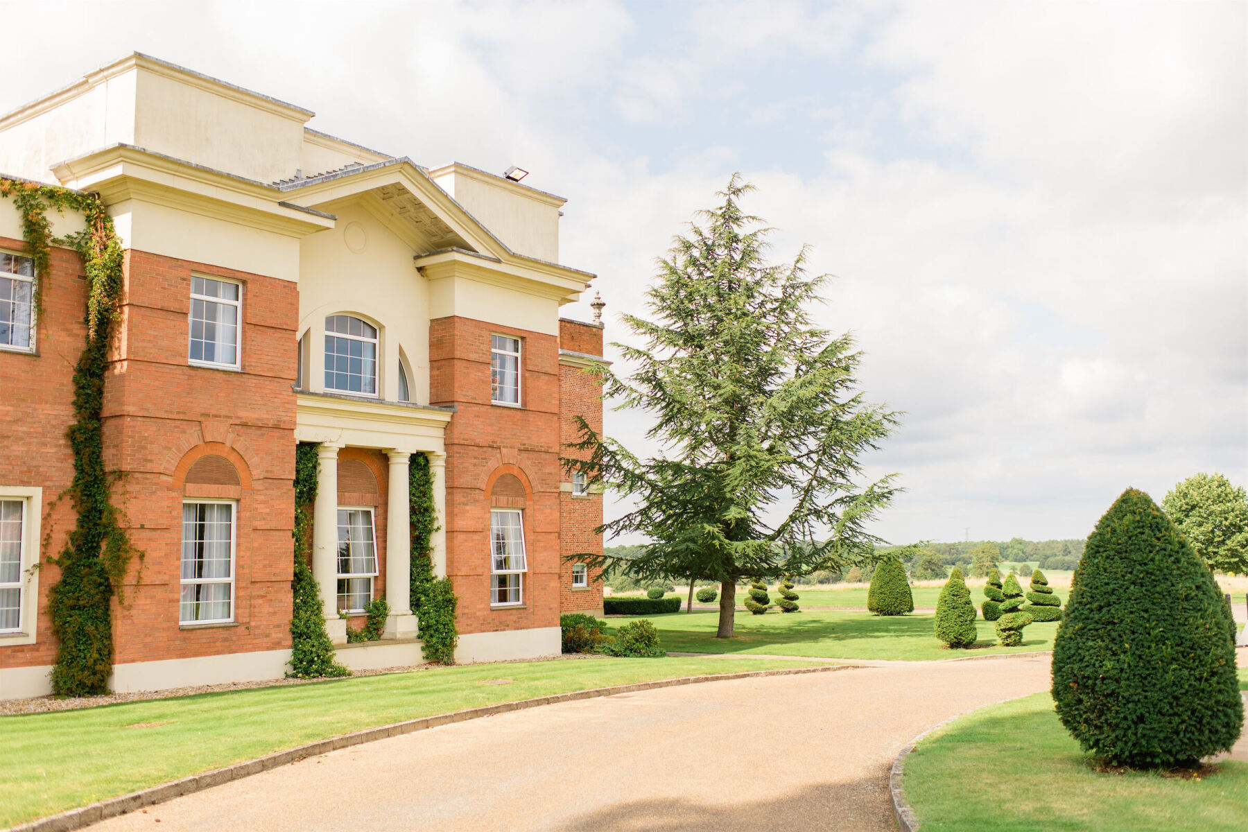 The Four Seasons Hampshire was the setting for a colorful countryside wedding weekend.