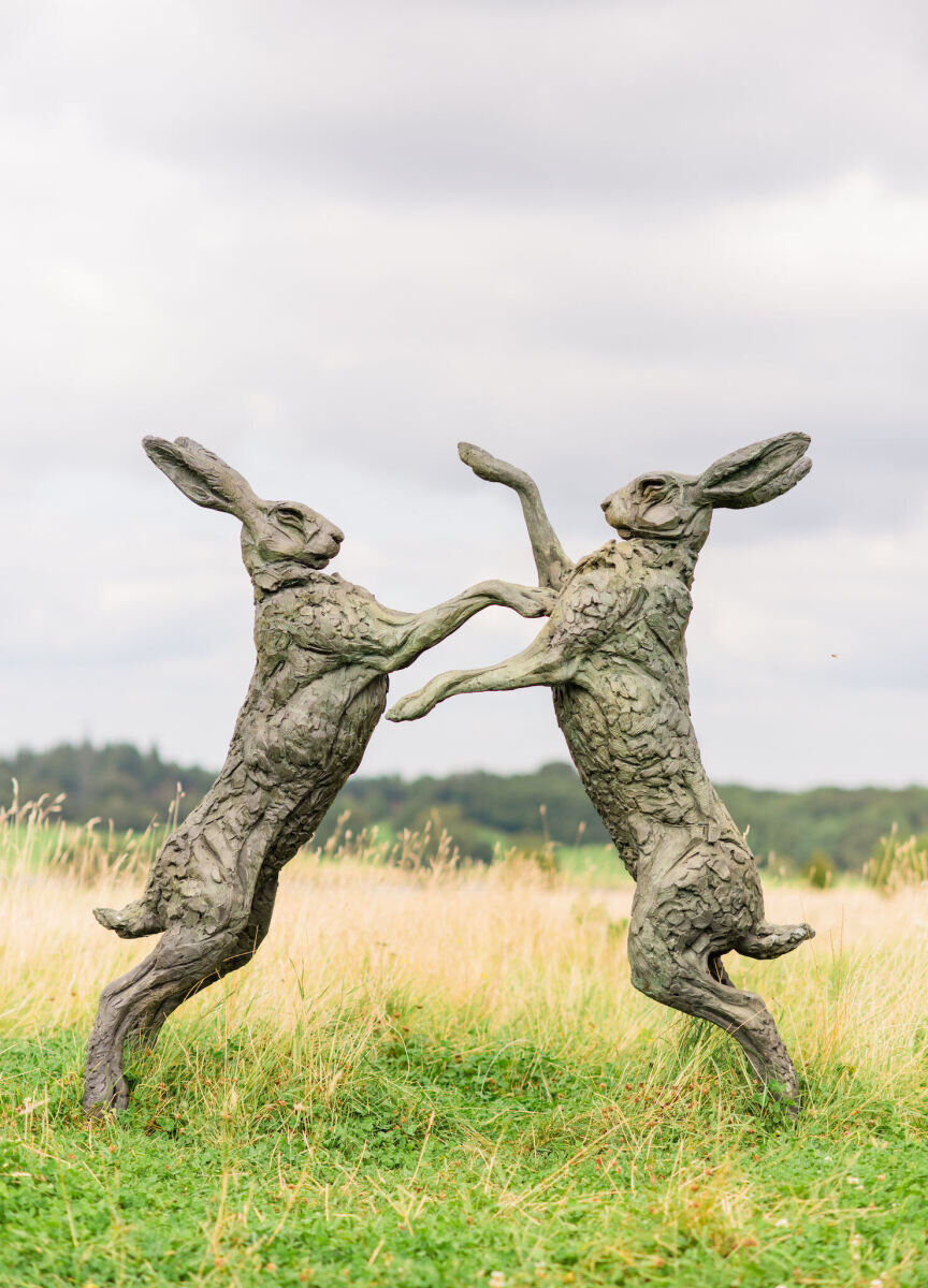Large rabbit sculptures were on view at the Four Seasons Hampshire, where a couple chose to hold their colorful countryside wedding weekend.