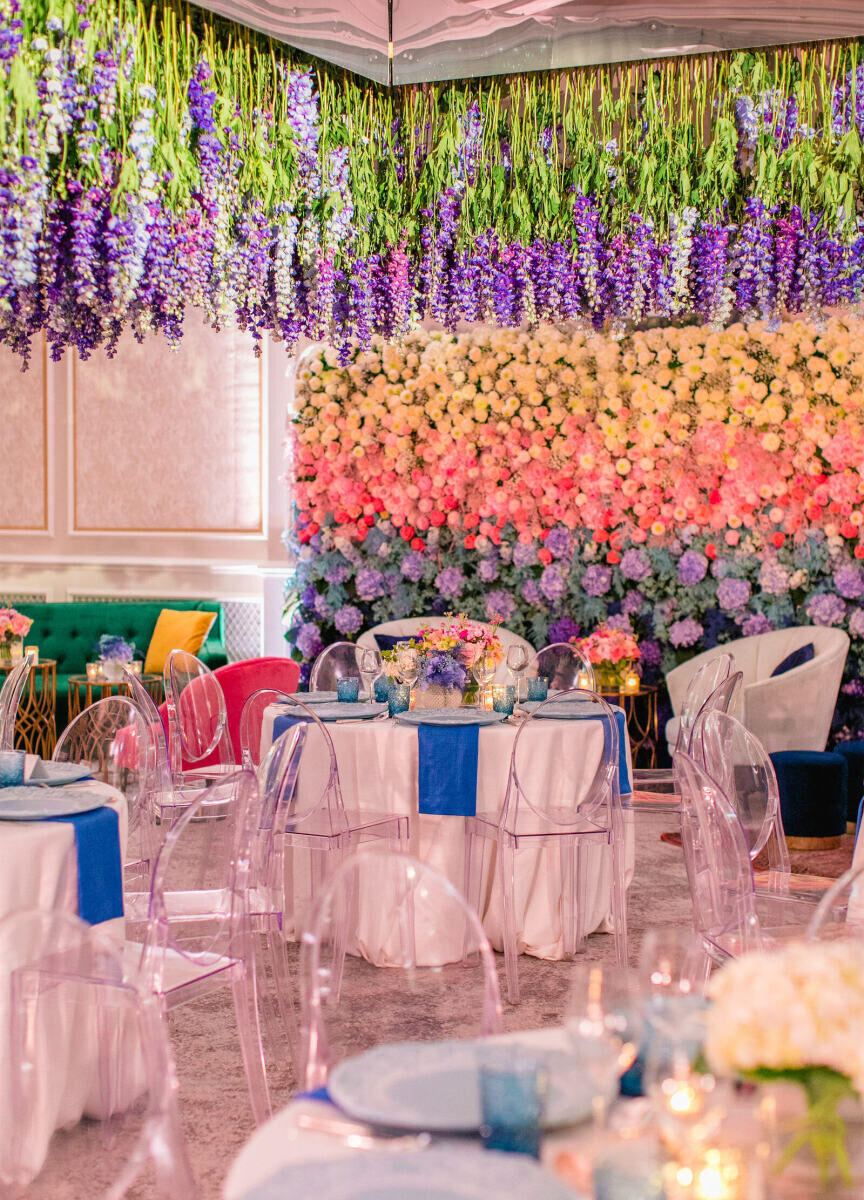 The palette for a colorful countryside wedding reception at the Four Seasons Hampshire was inspired by the beach.