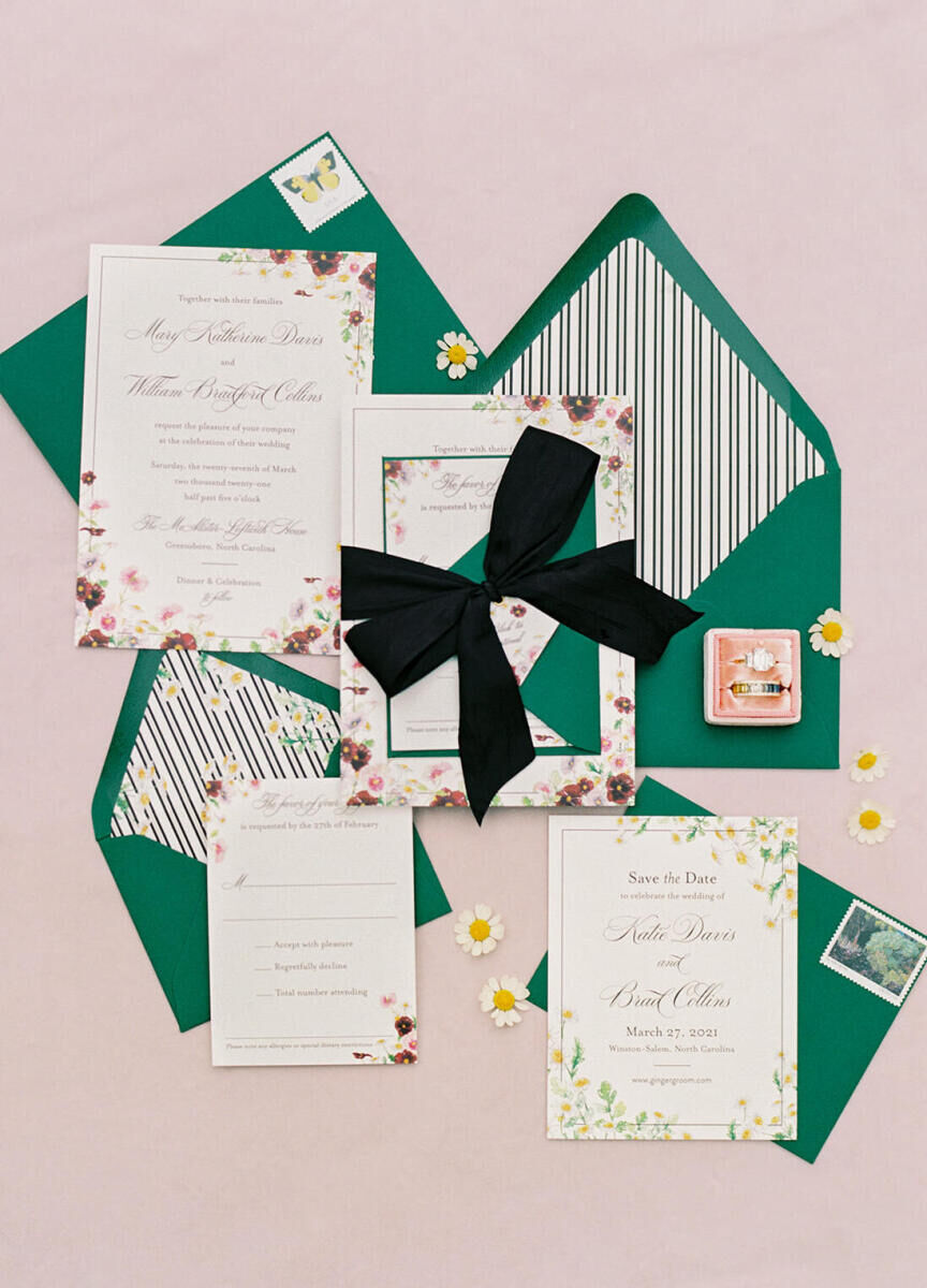 A colorful wedding invitation suite incorporating stripes and floral illustrations.