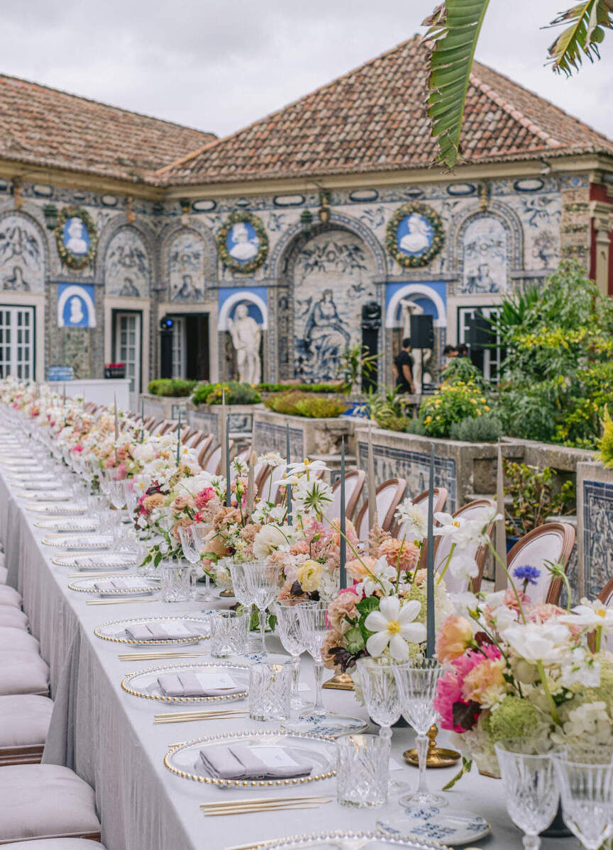 Best Places for a Colorful Wedding: A stunning outdoor reception setup with a long table at Palácio Fronteira.