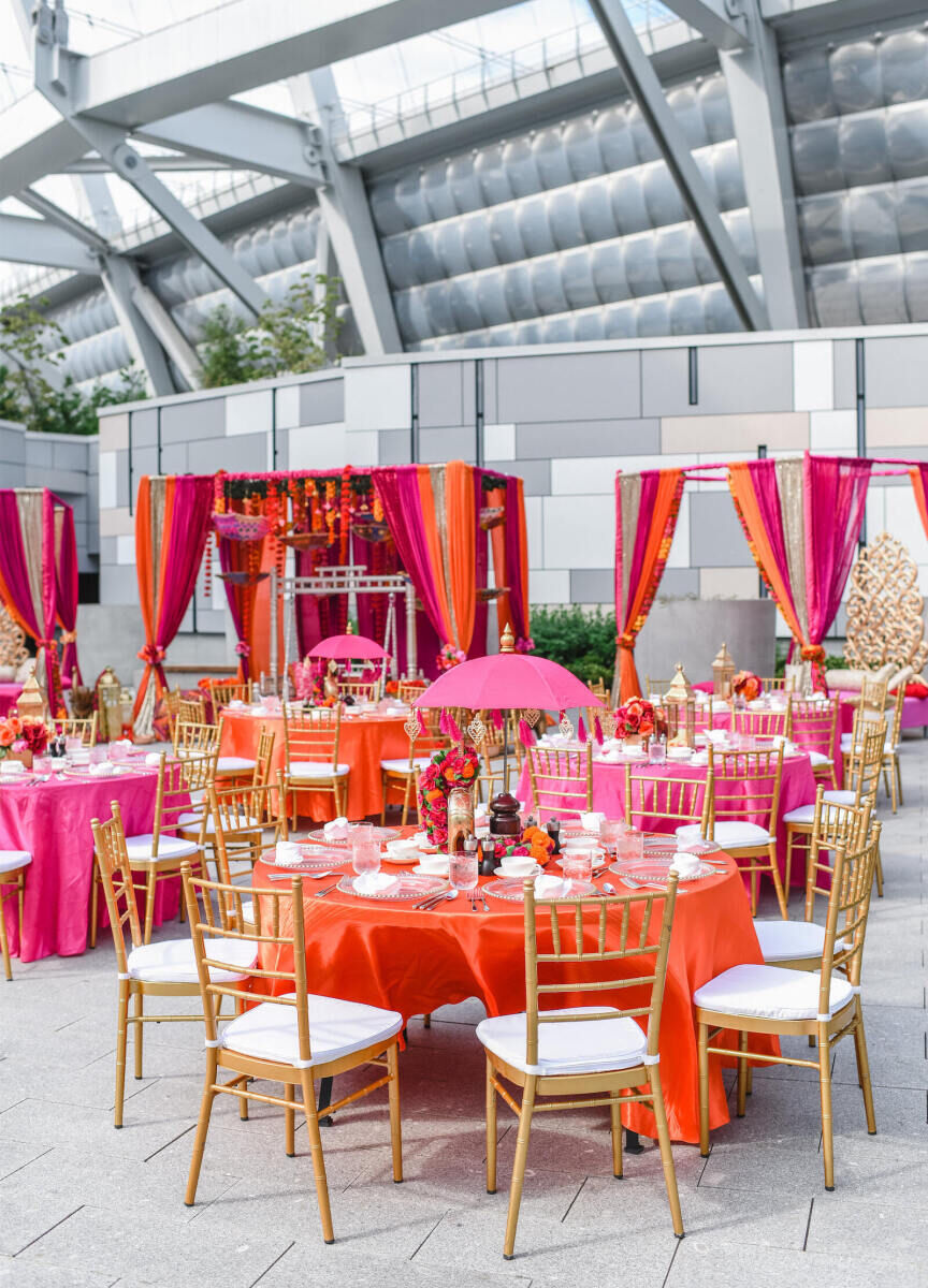 Best Places for a Colorful Wedding: A colorful reception set up with orange, pink, and red decor at JW Marriott Parq Vancouver.