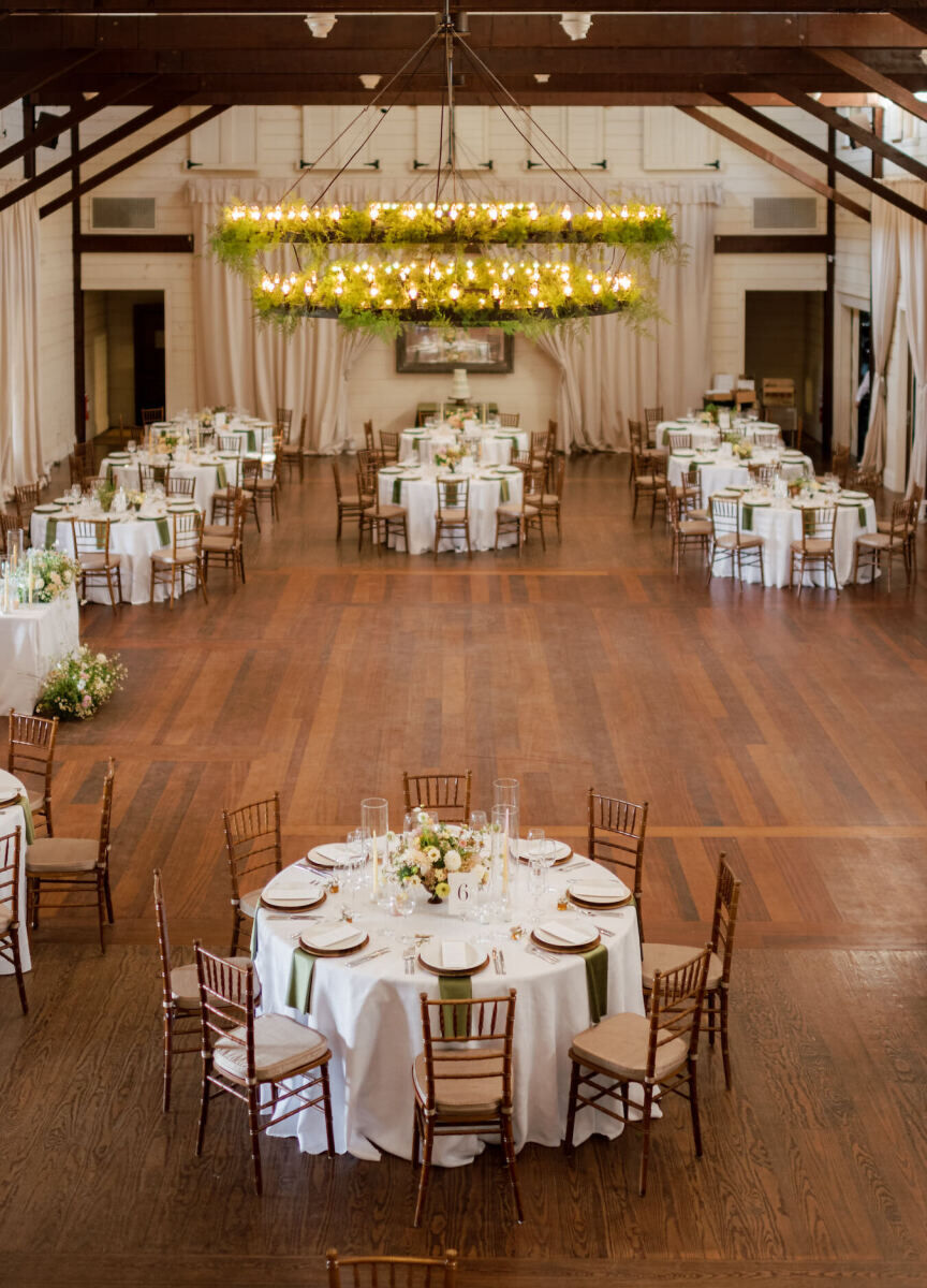 A cottagecore wedding reception in Virginia, with a color palette of neutrals like green, brown, and warm whites.