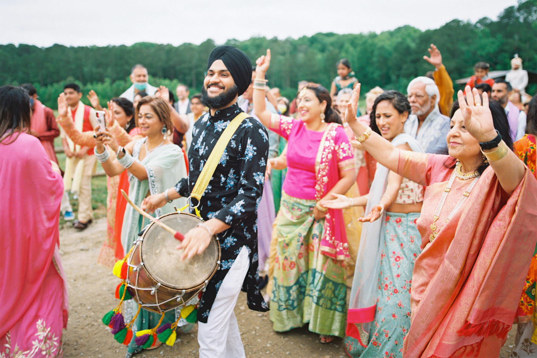 A lively baraat kicked off the wedding day during a weekend-long destination Indian wedding.