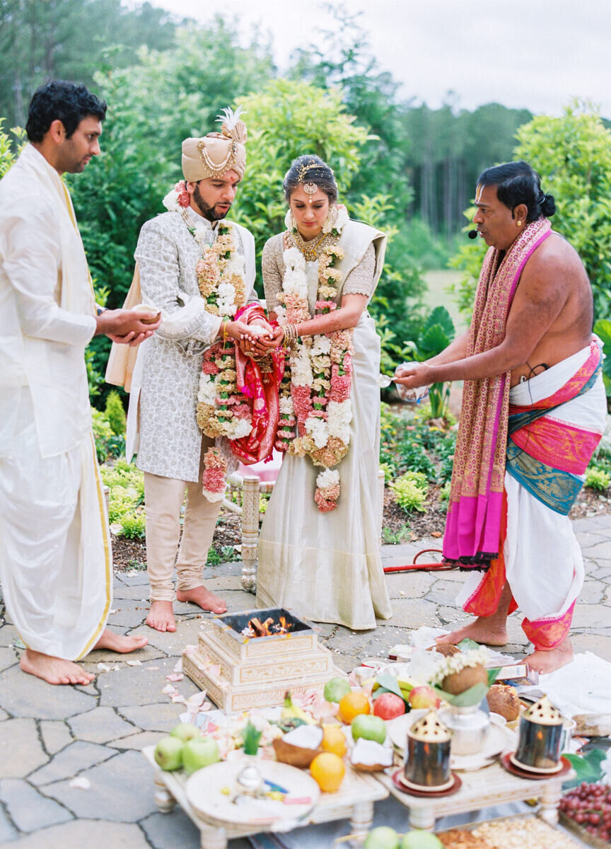 The Hindu ceremony took place outside during this destination Indian wedding in North Carolina. 