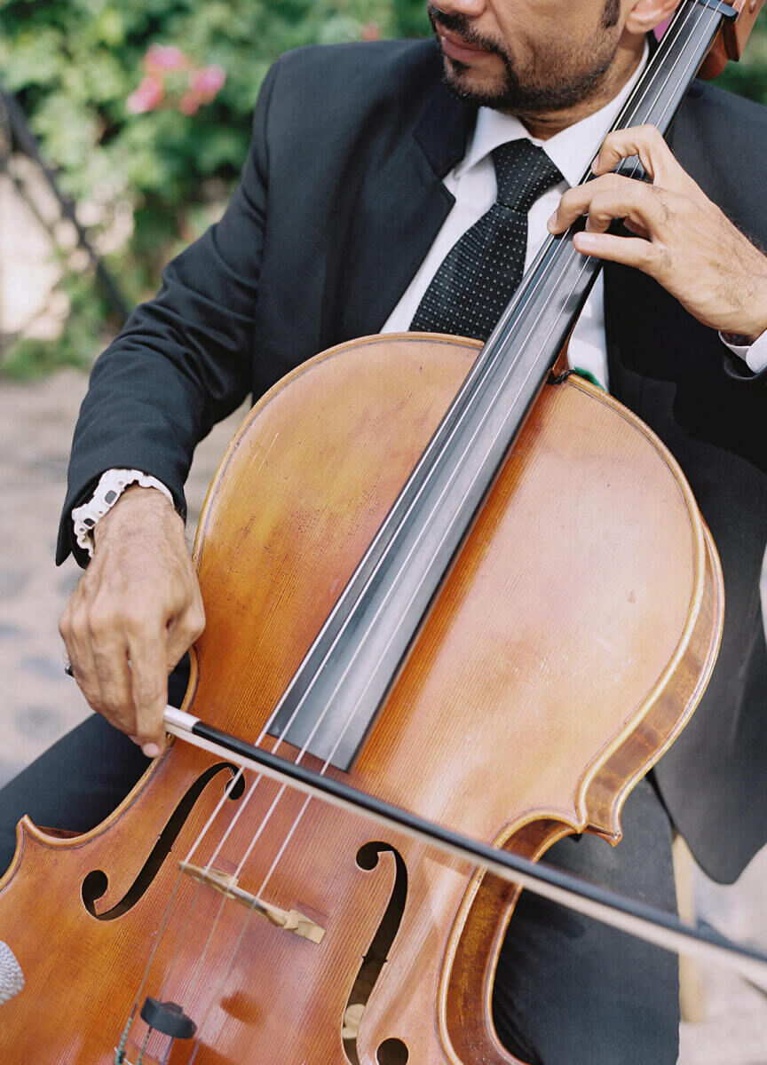 A violinist played as part of the ceremony music during a destination wedding.