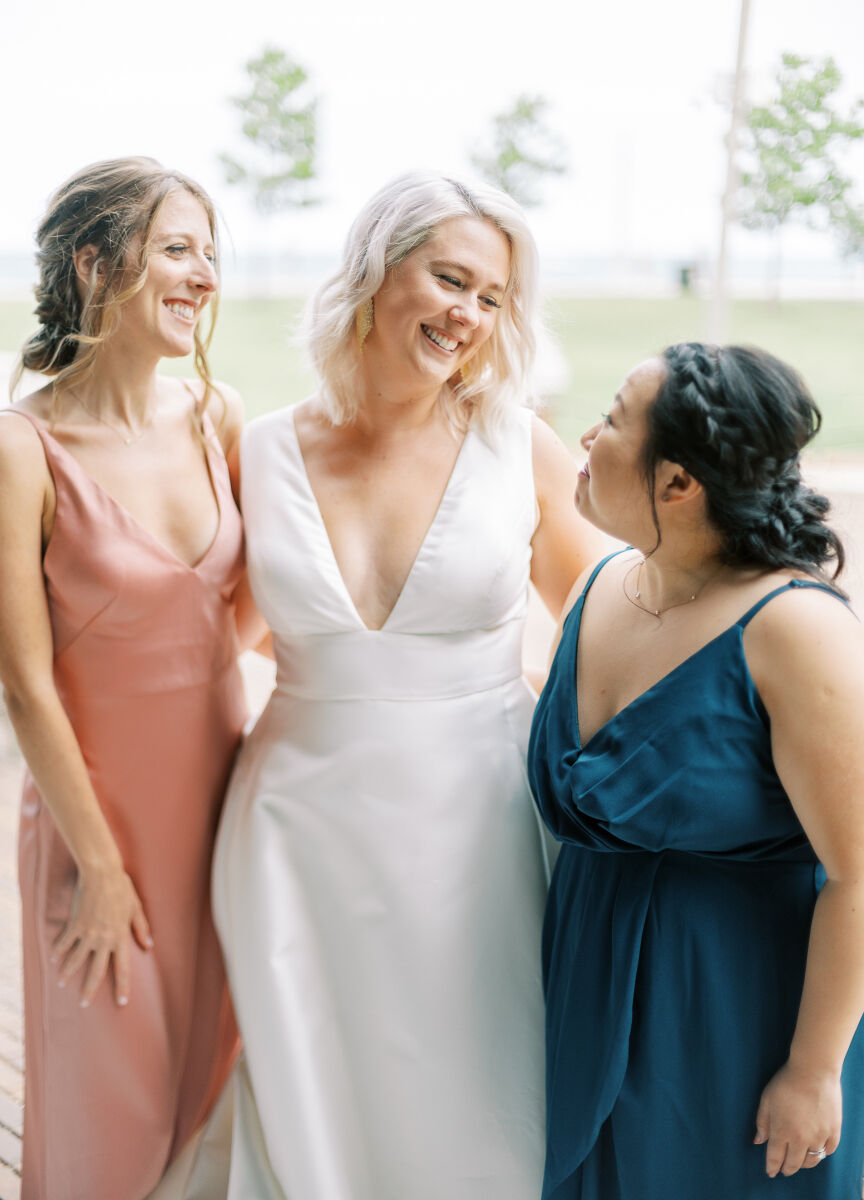 A bride and her two maids of honor all had their hair and makeup done for the enchanted waterfront wedding.