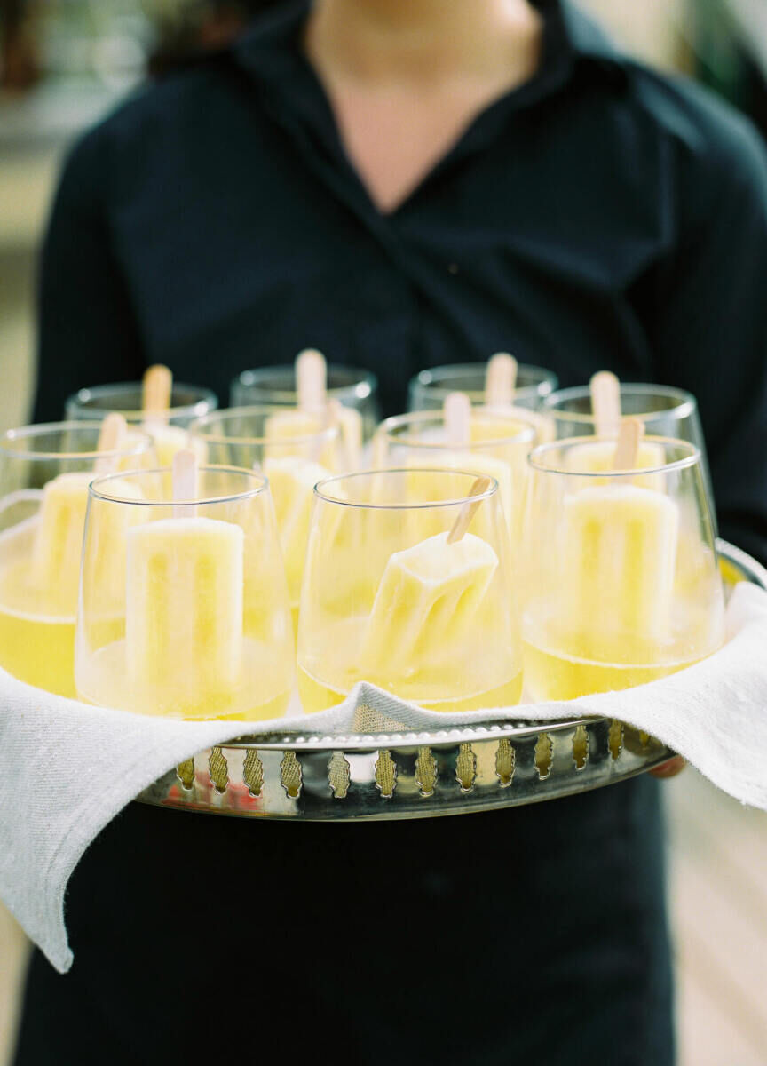 Ice pops in champagne were passed during the cocktail hour of a forest wedding in Canada.