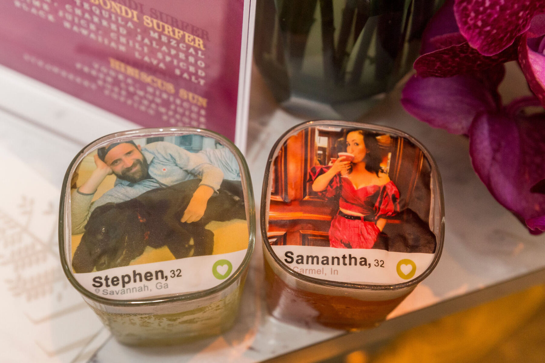 Drinks were topped with edible renderings of the bride and groom's Tinder profiles at their glam enchanted wedding.