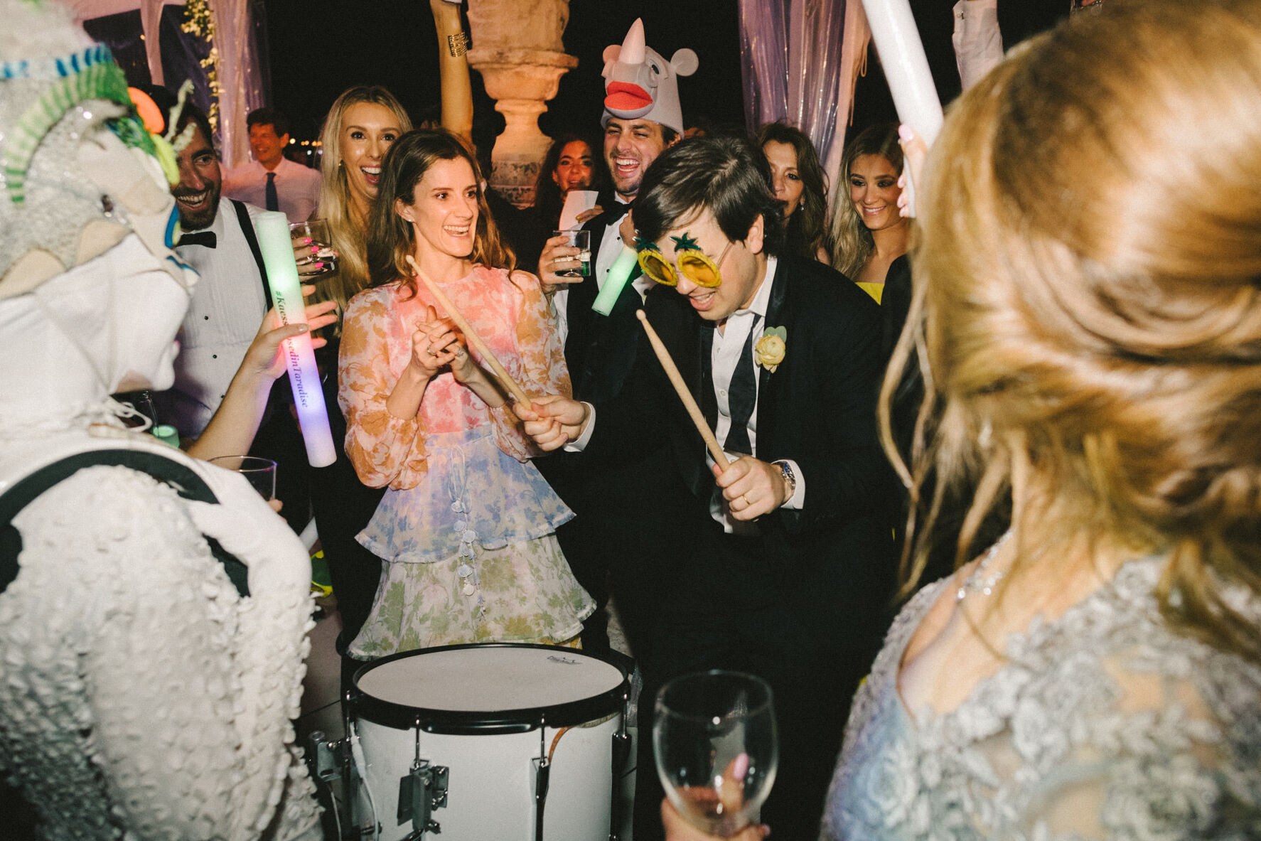 Guests interacted with the entertainers at an hora loca during a glam, garden wedding reception.