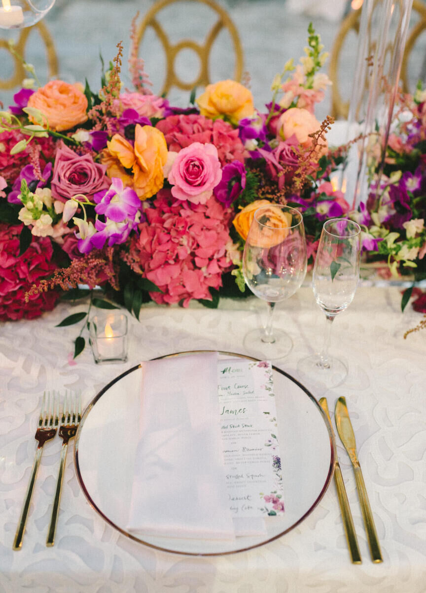 Gold tabletop pieces added a modern edge to a glam, garden wedding.