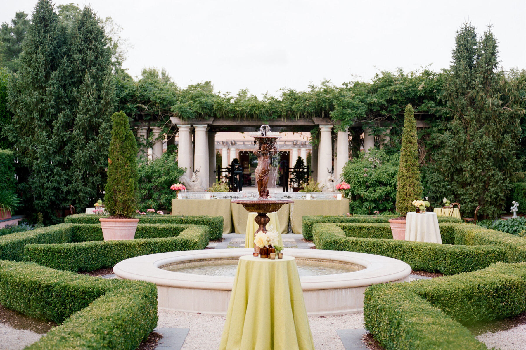 A cocktail hour setup in the garden at a Glenmere Mansion wedding.