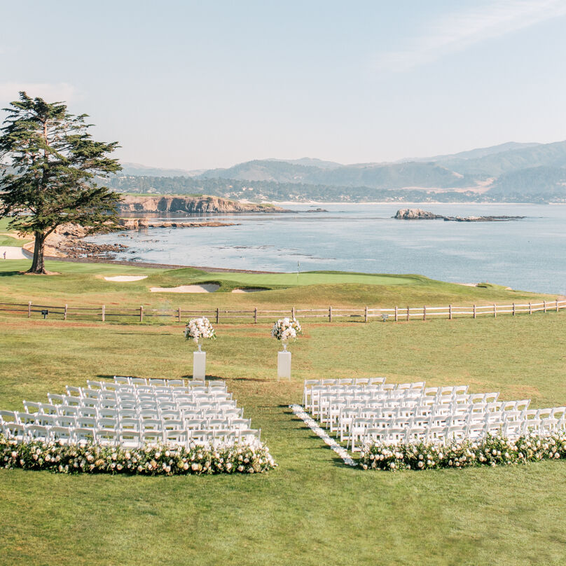 Golf Course Wedding Venues: A ceremony setup overlooking the ocean in Pebble Beach, California.