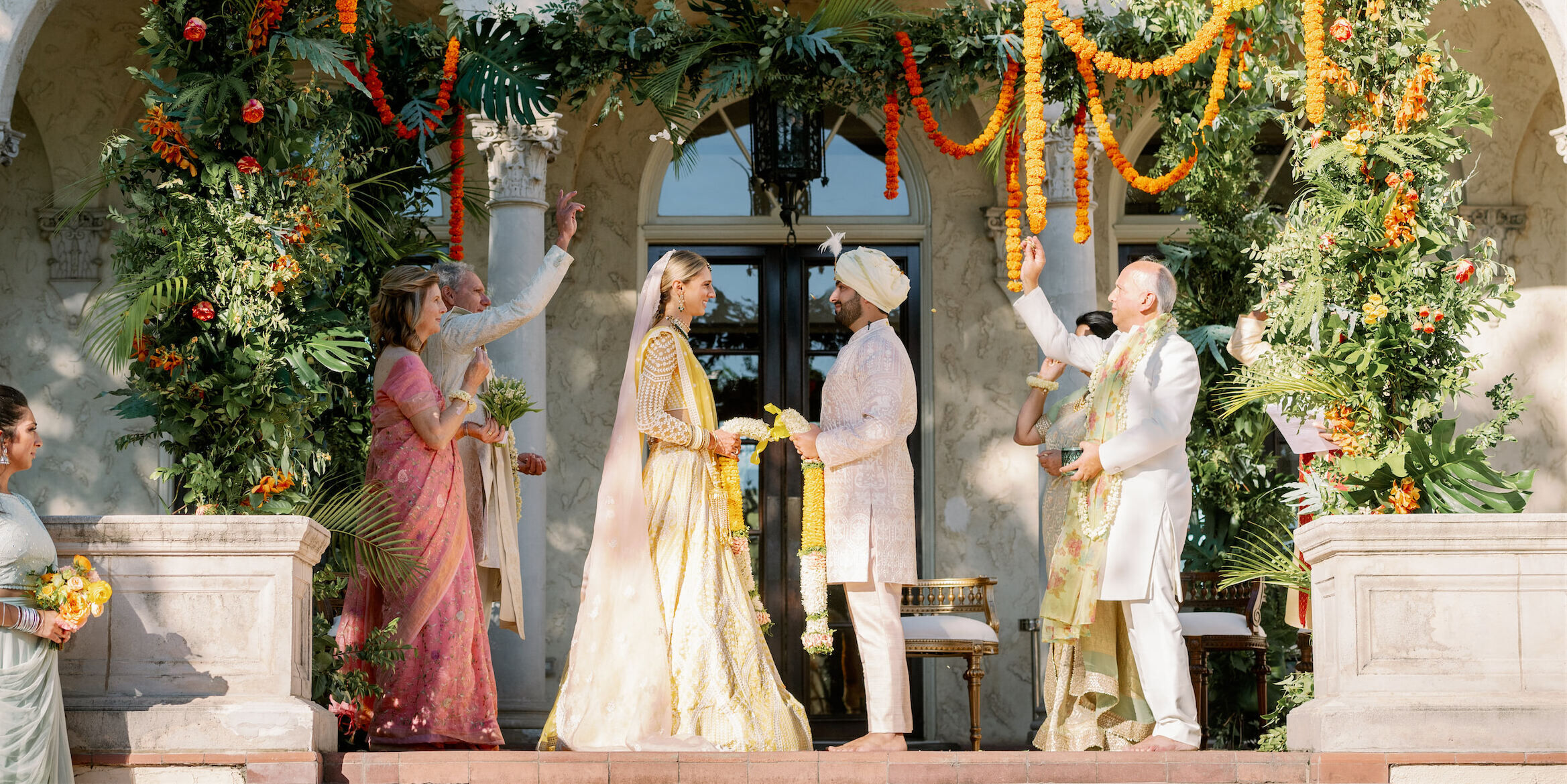 A bride and groom during their Indian fusion wedding ceremony at Commodore Perry Estate in Austin, Texas.