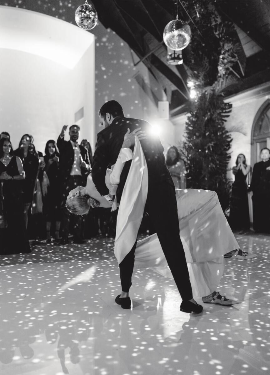 The after-party of a Indian fusion wedding was filled with disco balls for the couple and their guests to dance under.