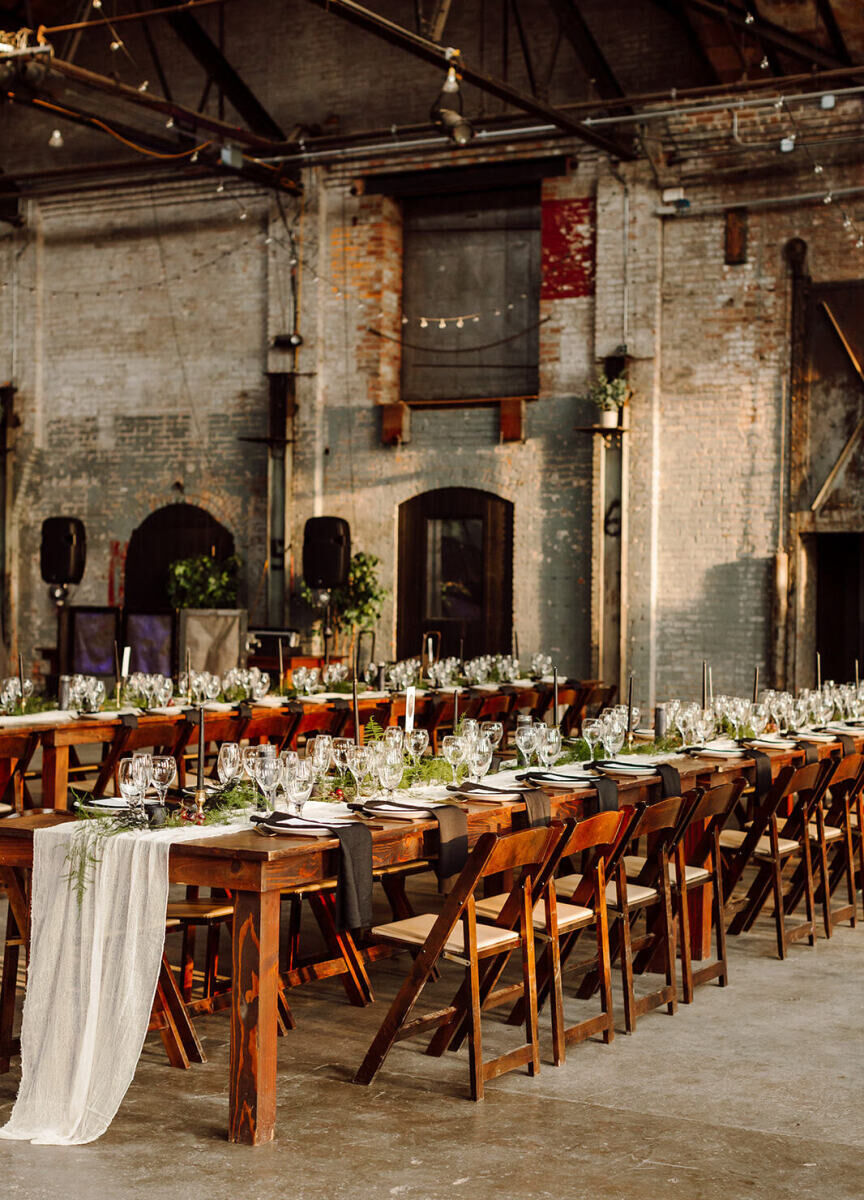 Industrial Wedding Venues: A reception set-up with natural light spilling in at Basilica Hudson.