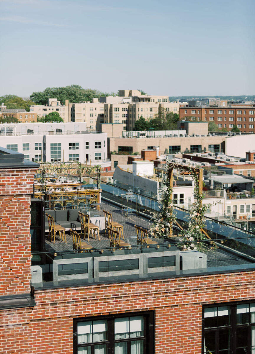 Industrial Wedding Venues: A drone view of an outdoor ceremony set-up on the rooftop of The Line DC.
