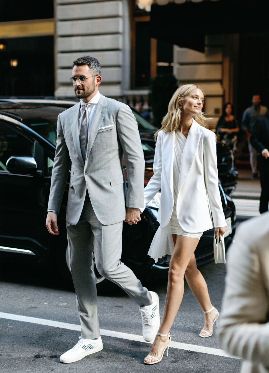 Kate Bock Kevin Love Wedding: Kevin Love and Kate Bock walking to their rehearsal dinner at the Polo Bar in New York City.