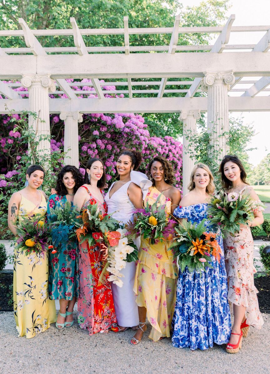 Mismatched bridesmaid dresses: See more assorted tropical patterned unique bridesmaid dresses from Dalila and Elliot's waterfront wedding