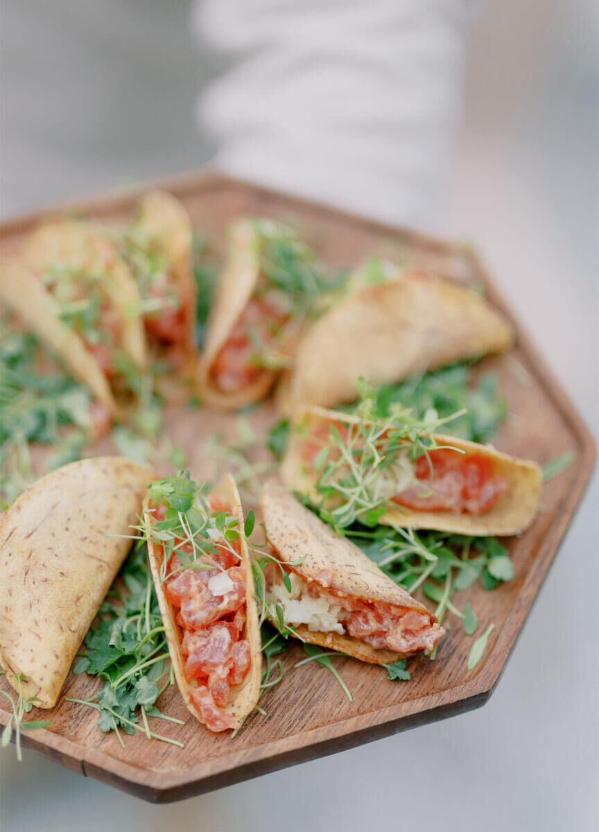 Tacos were served during the cocktail hour of a modern California wedding.