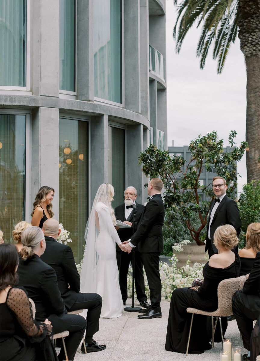 The bride's grandfather officiated at this modern California wedding ceremony outside at the Santa Monica Proper hotel.