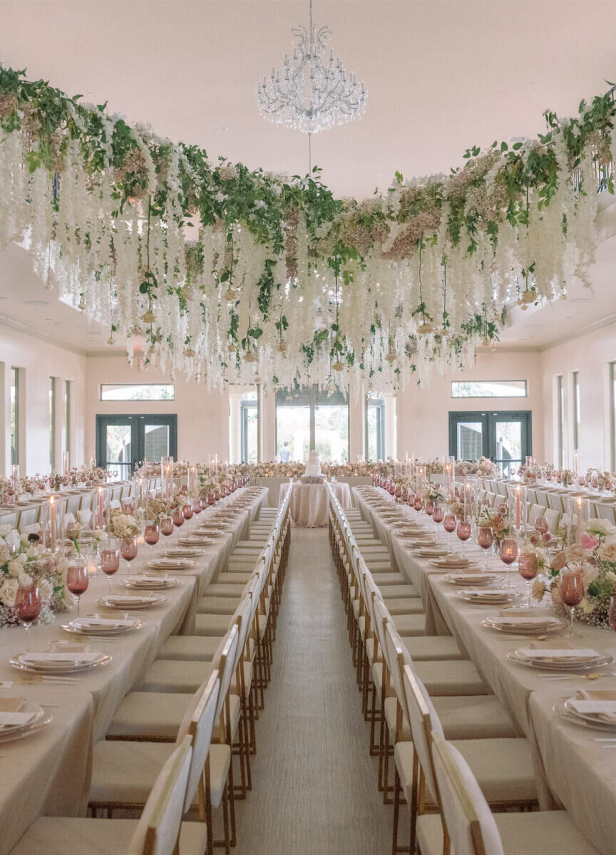 Upholstered chairs softened the reception space of a modern fairytale wedding.