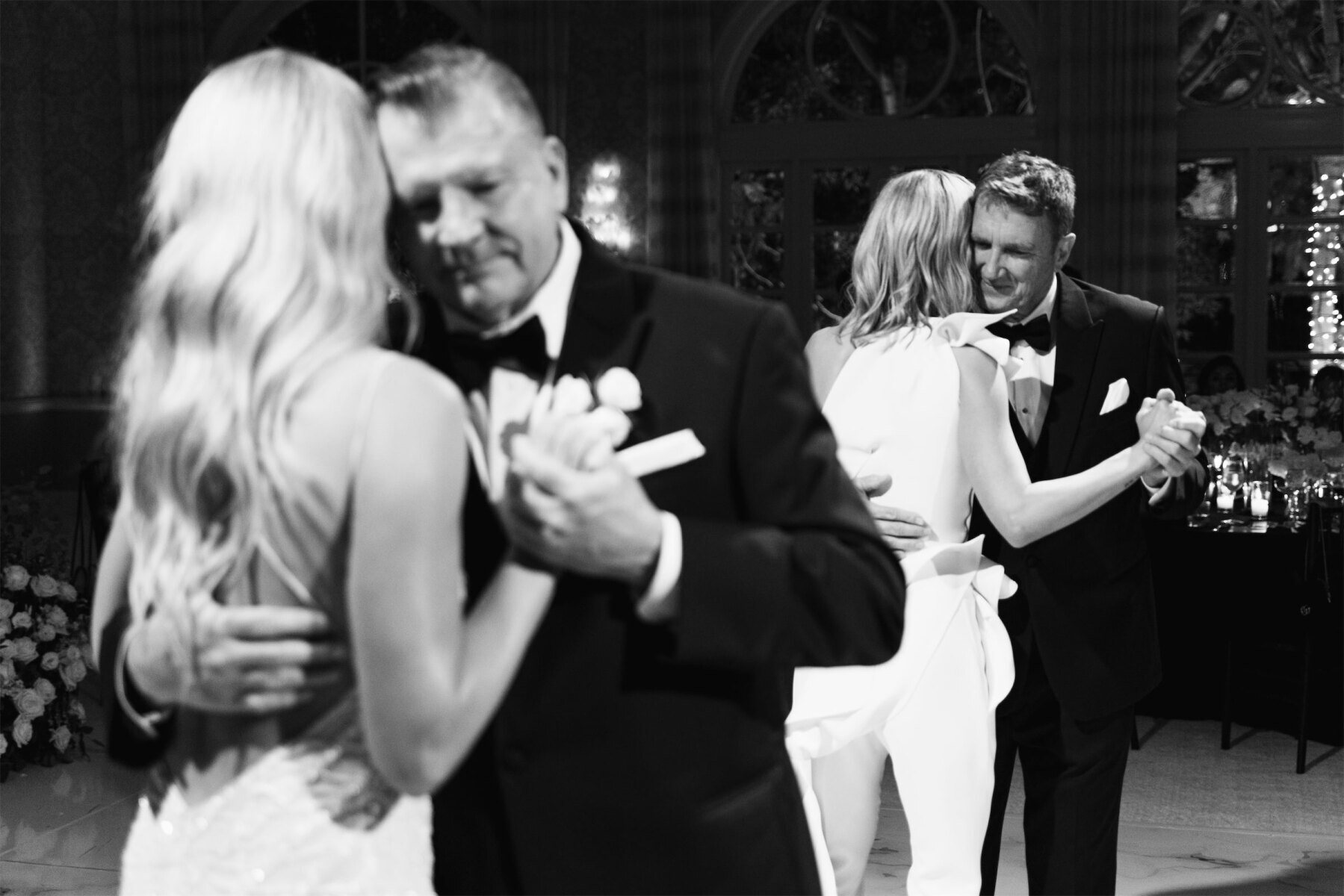 Newlywed brides take to the dance floor for a joint father-daughter dance at their modern wedding in Beverly Hills.