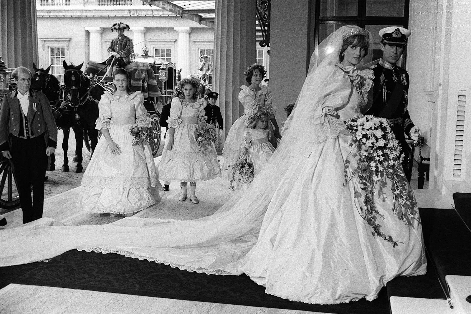 Most Influential Women in History Weddings: Diana Spencer, Princess of Wales wedding day exit, walking with husband Prince Charles down the aisle