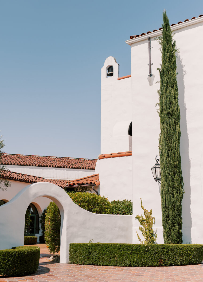 An exterior of the Ojai Valley Inn, a hotel and wedding venue in California.