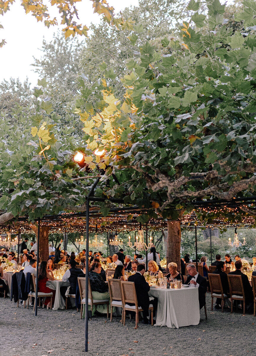 Romantic Wedding Venues: A dreamy outdoor reception set up under the trees and twinkly lights of Beaulieu Garden.