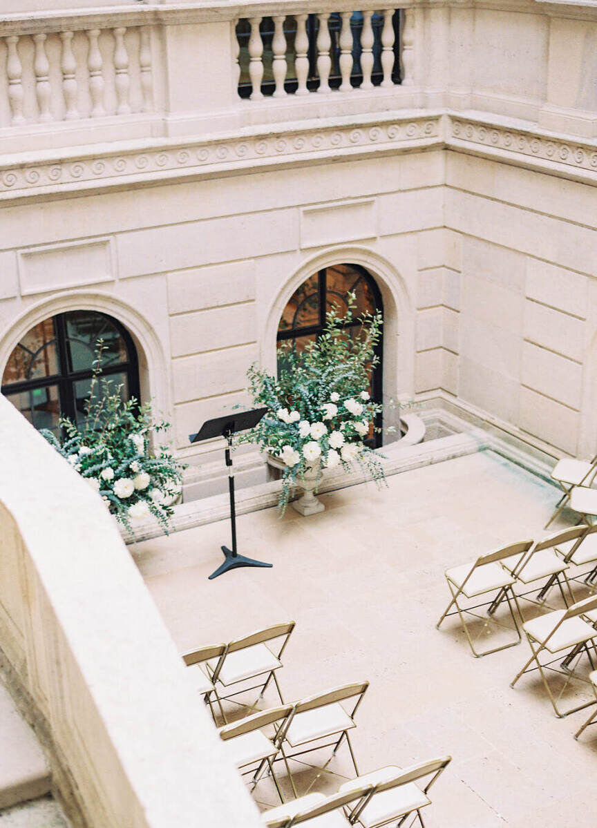 Romantic Wedding Venues: An outdoor ceremony set-up on a sunny day at Burden Kahn Mansion in New York, New York.