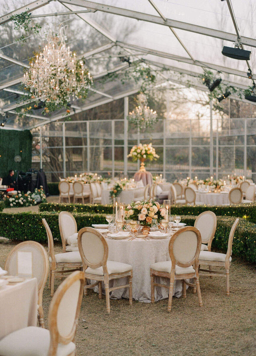 Romantic Wedding Venues: An indoor reception setup in a greenhouse-style room at Commodore Perry Estate in Austin, Texas.