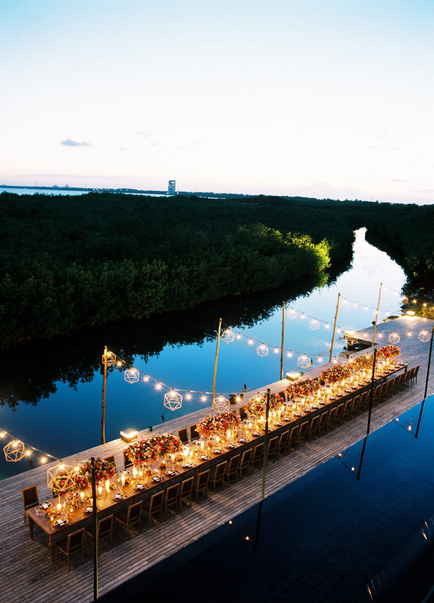 Romantic Wedding Venues: An evening reception setup at NIZUC Resort & Spa with twinkly lights hanging overhead.
