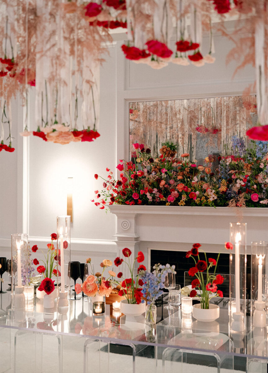 The ballroom of a hotel in DC was transformed for the reception for their surprise wedding, which was all about color.