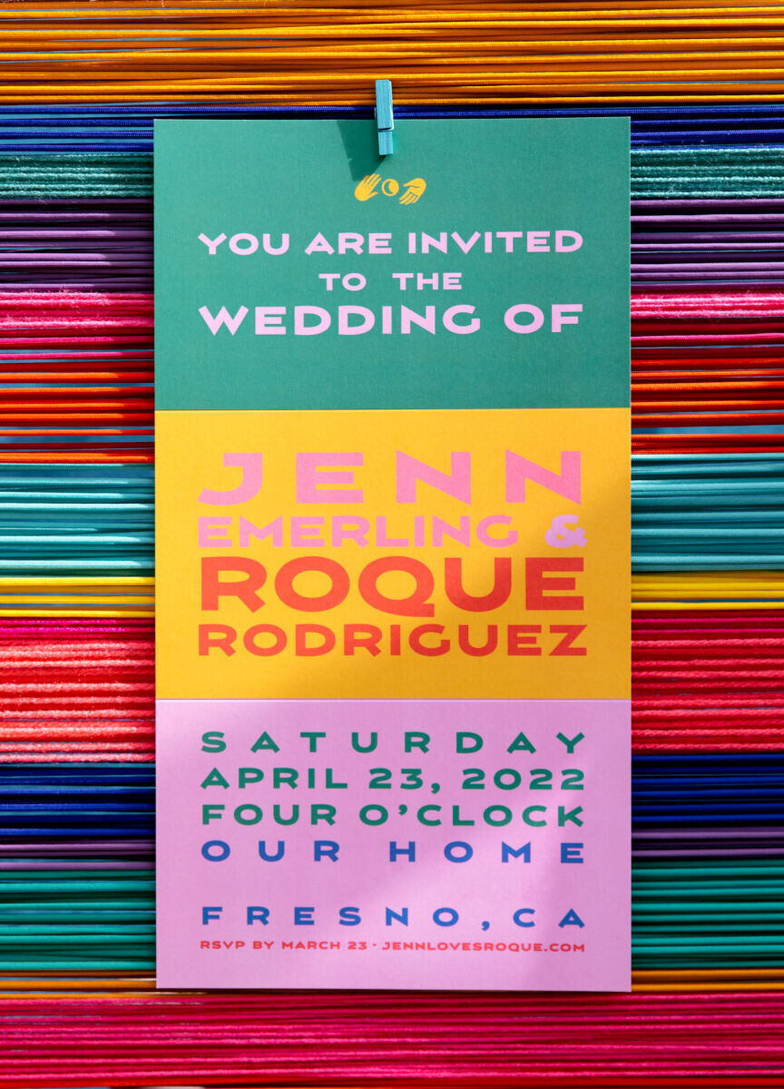 The invites for this vibrant outdoor wedding were intended to feel more like a festival poster instead of a typical card.