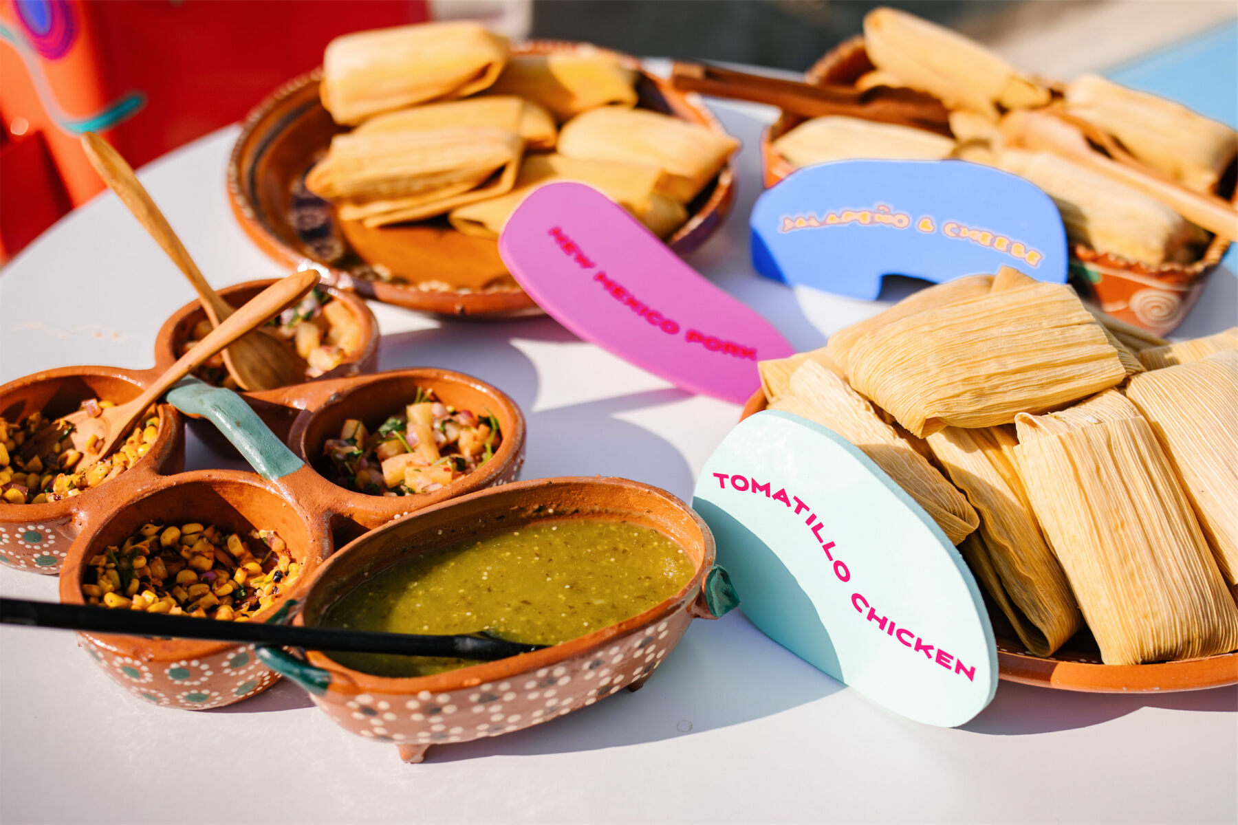 Tamales and salsa were also served at this vibrant, outdoor wedding reception.
