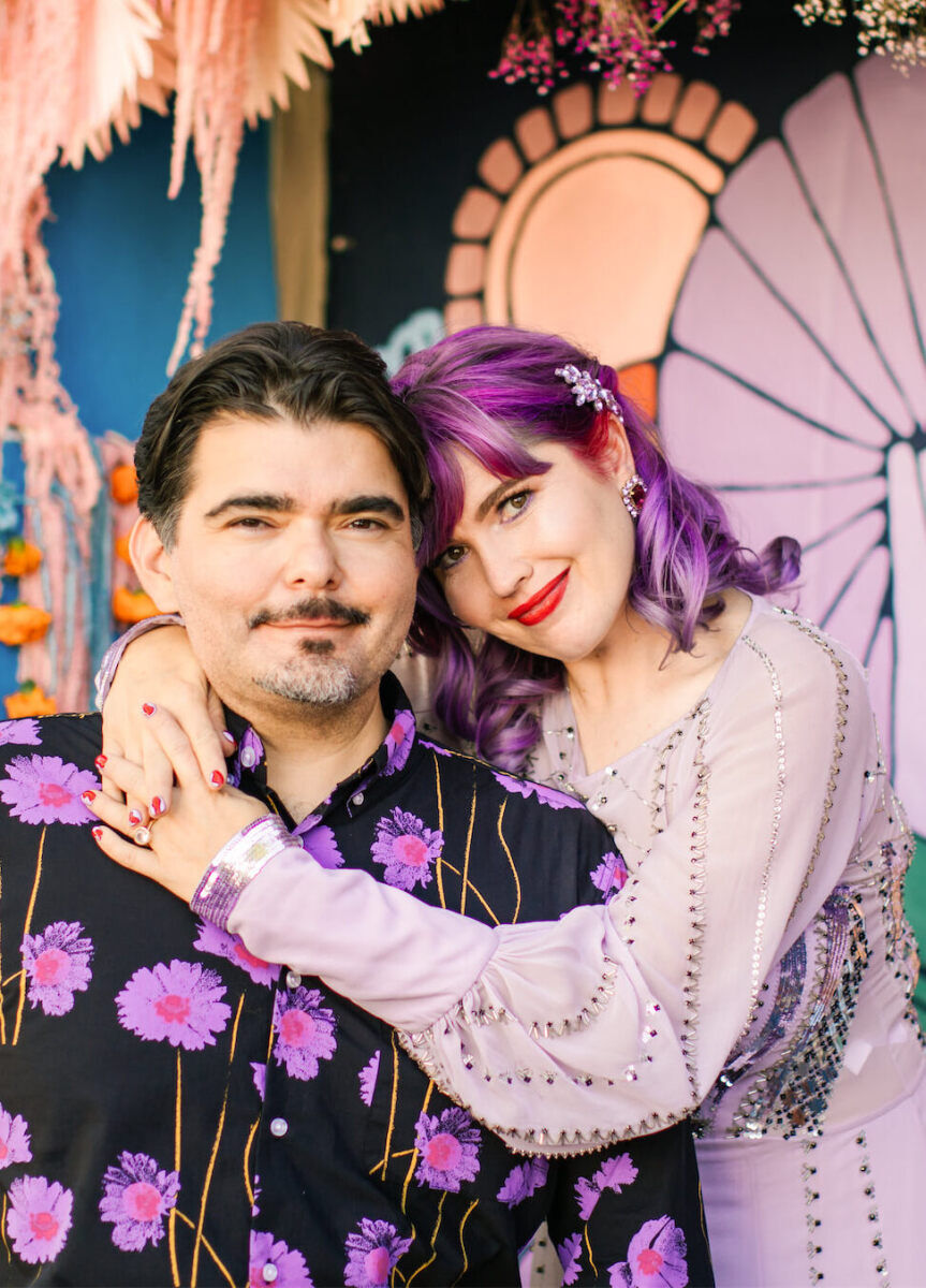 Purple and red were two colors present throughout this couples vibrant, outdoor wedding day, but also in the bride's hair, makeup, and manicure.