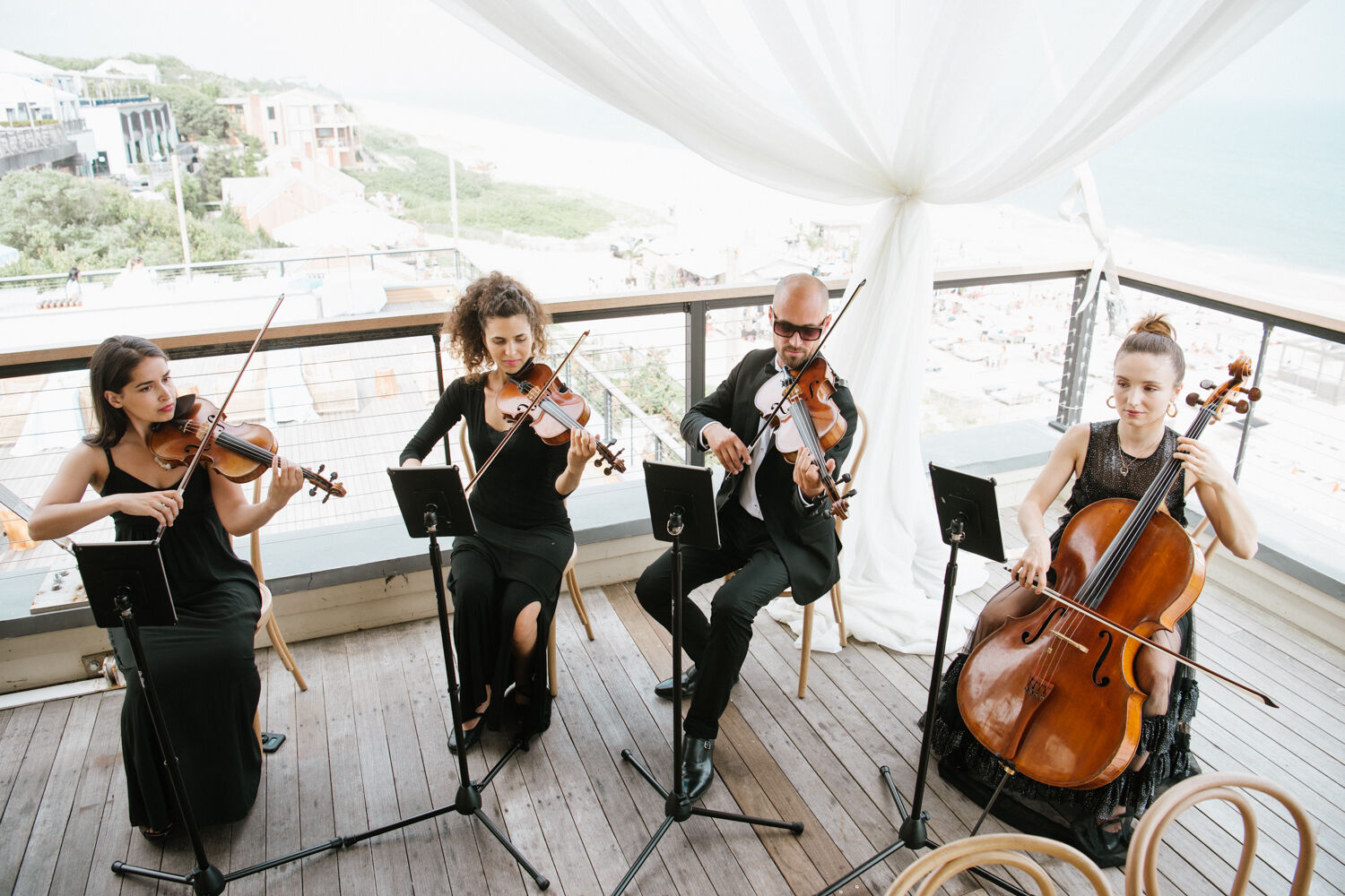Learn more about the wedding musician from Hannah & Tyler's modern wedding