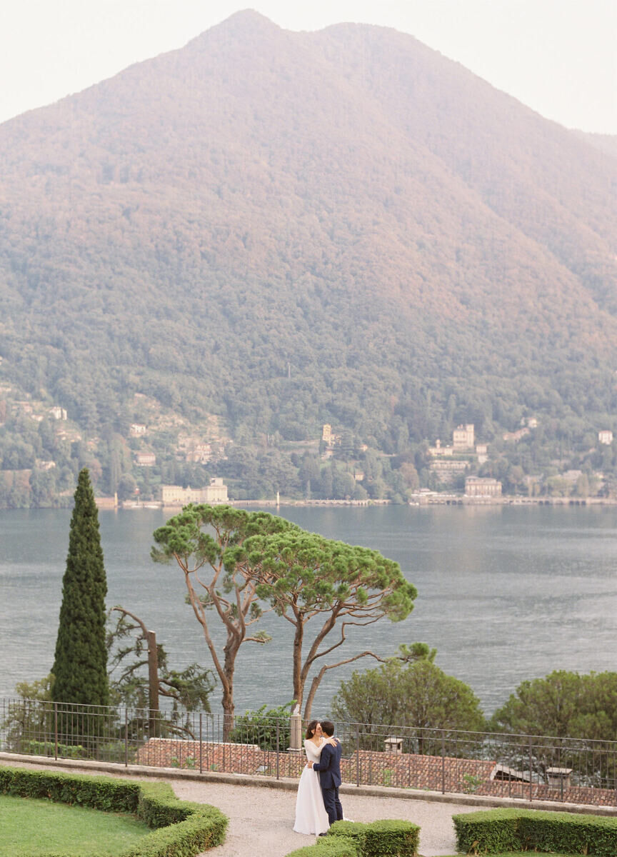 Wedding News: A couple kissing with beautiful Italy lakes and nature in the background.